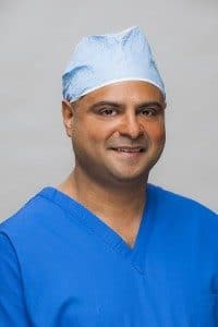Dr. Nakul Karkare in blue scrubs