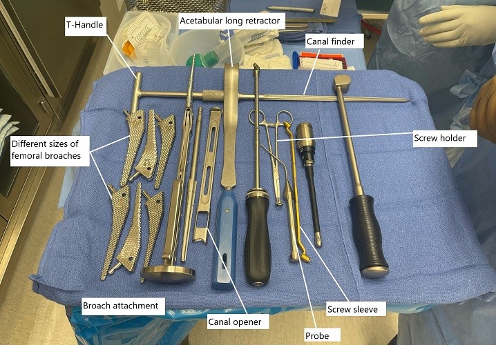 Intraoperative image showing instruments used in total hip replacement.
